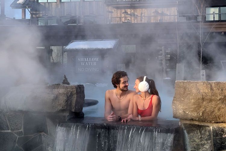 couple in a hot thermal bath at Thermea Spa Village Whitby