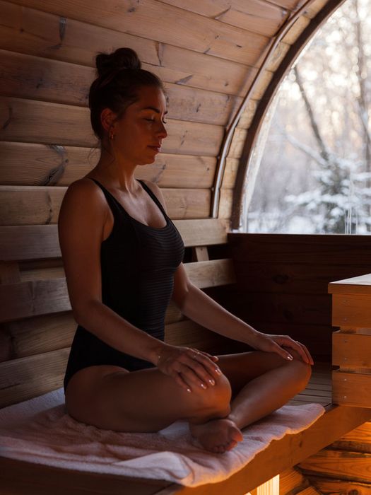 woman relaxing in a sauna