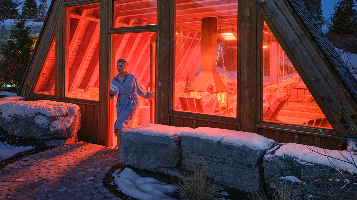 guest walking out of a heated A-Frame rest area