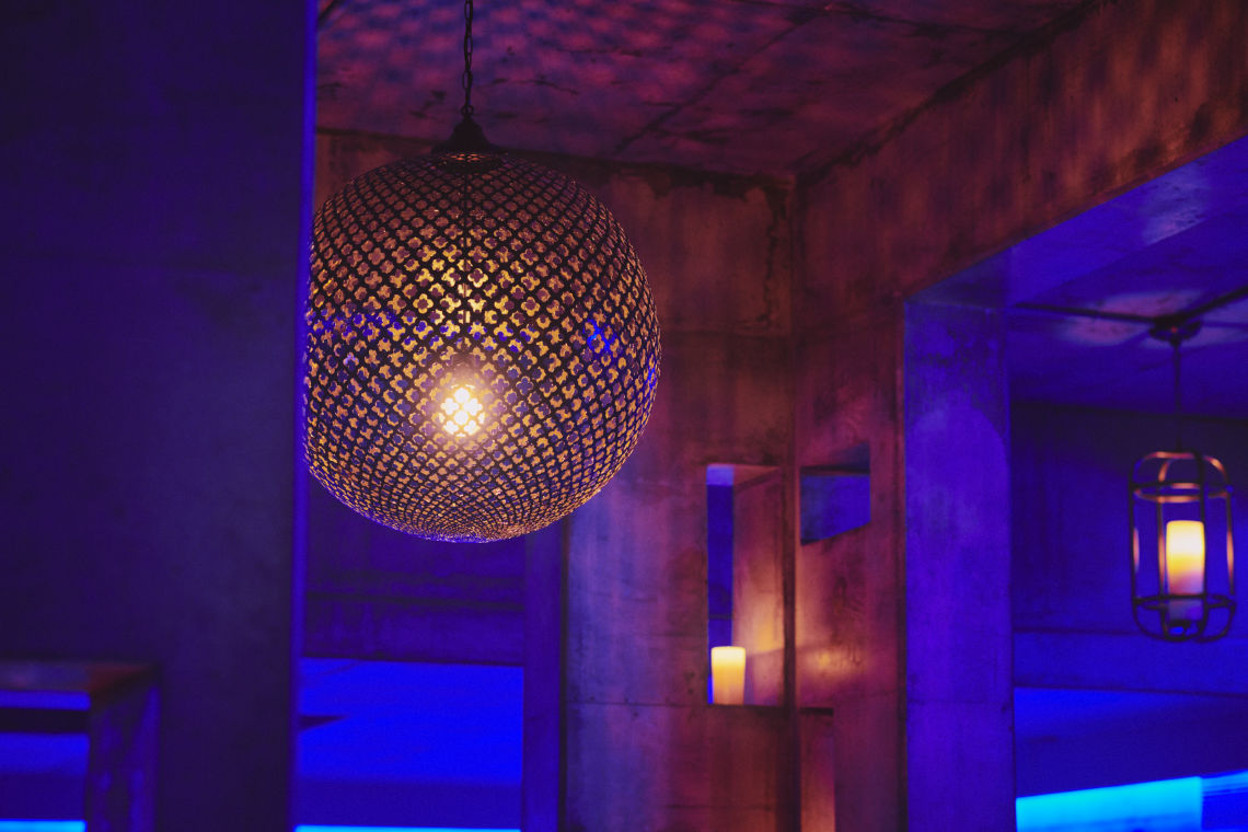 lantern reflecting off the walls of kalla