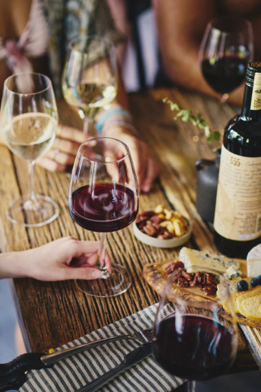 restaurant table with wine glasses and food