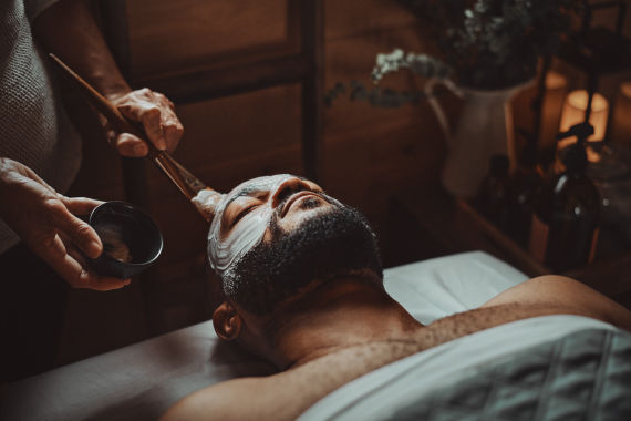man enjoying a face care