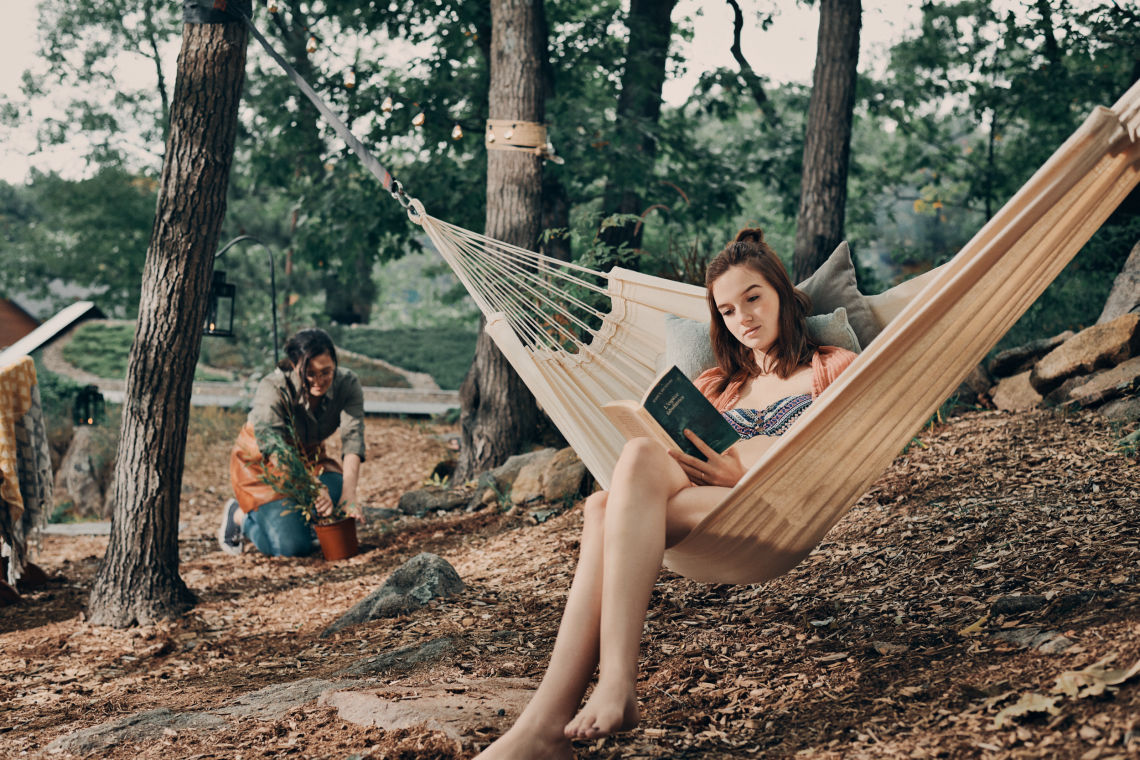 woman relaxing in a hammock