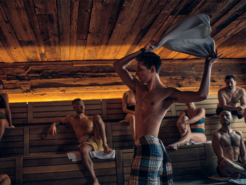 rituals artisan waving a towel during aufguss ritual