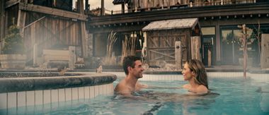 guest enjoying outdoor thermal baths