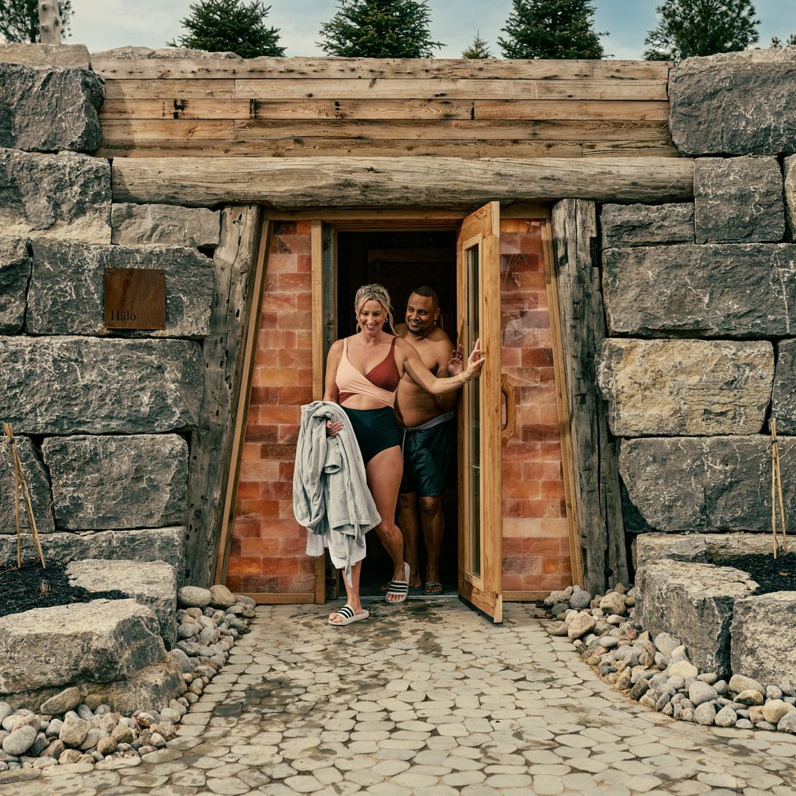 couple exiting the halo sauna