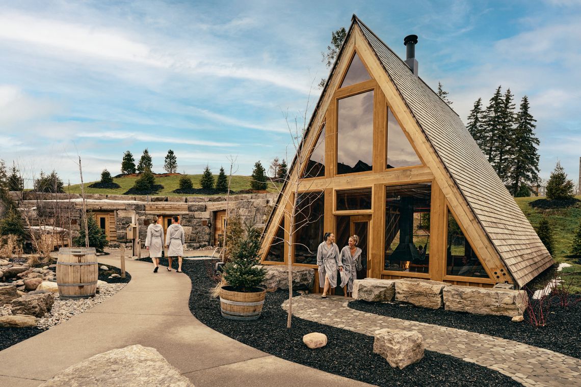 guests walking in front of the A-frame