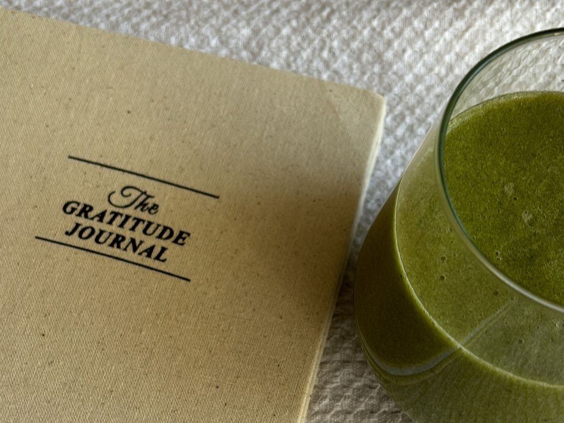 gratitude journal and green juice