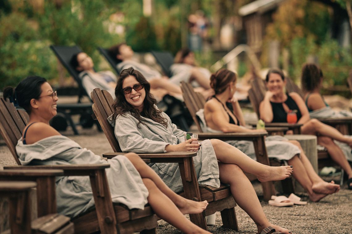 women chatting in an outside rest area