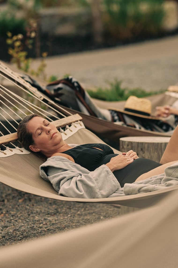 guest resting in a hammock