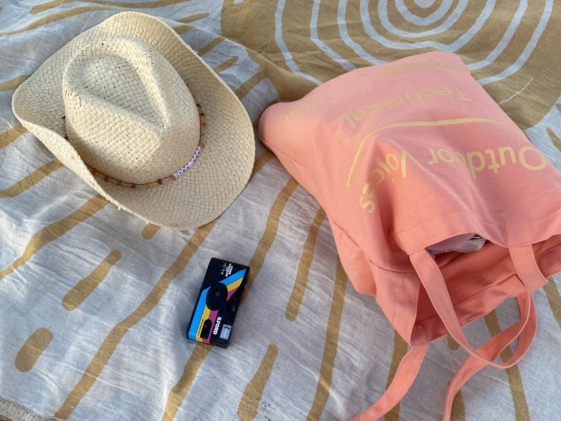 cowboy hat and bag on a towel