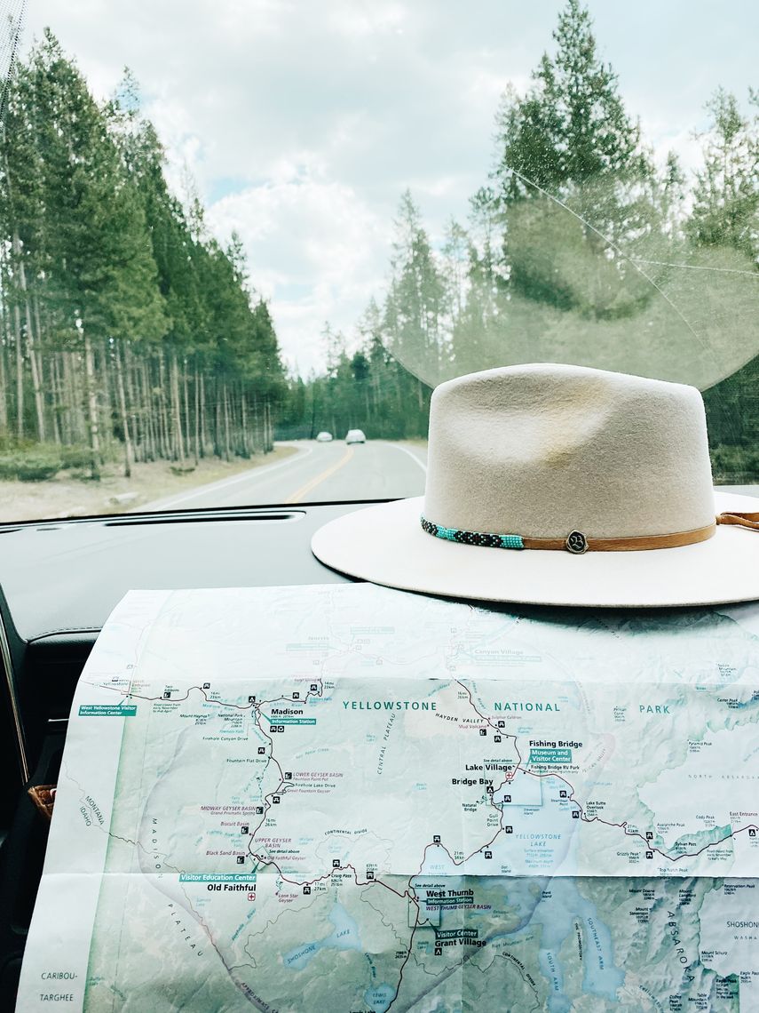 roadtrip with map and hat