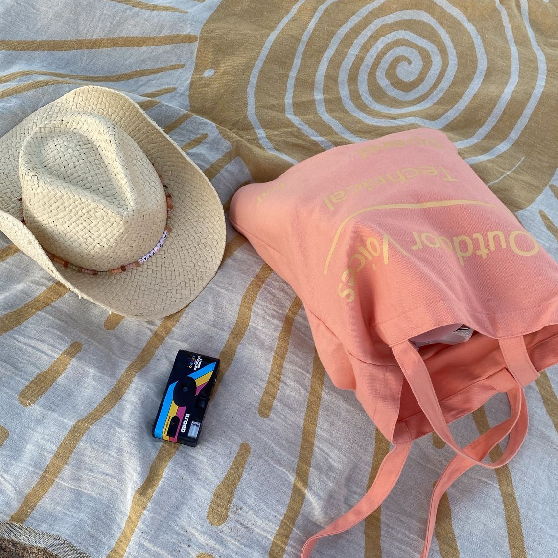 cowboy hat and bag on a towel