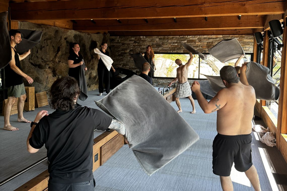 artisans practicing towel waving techniques