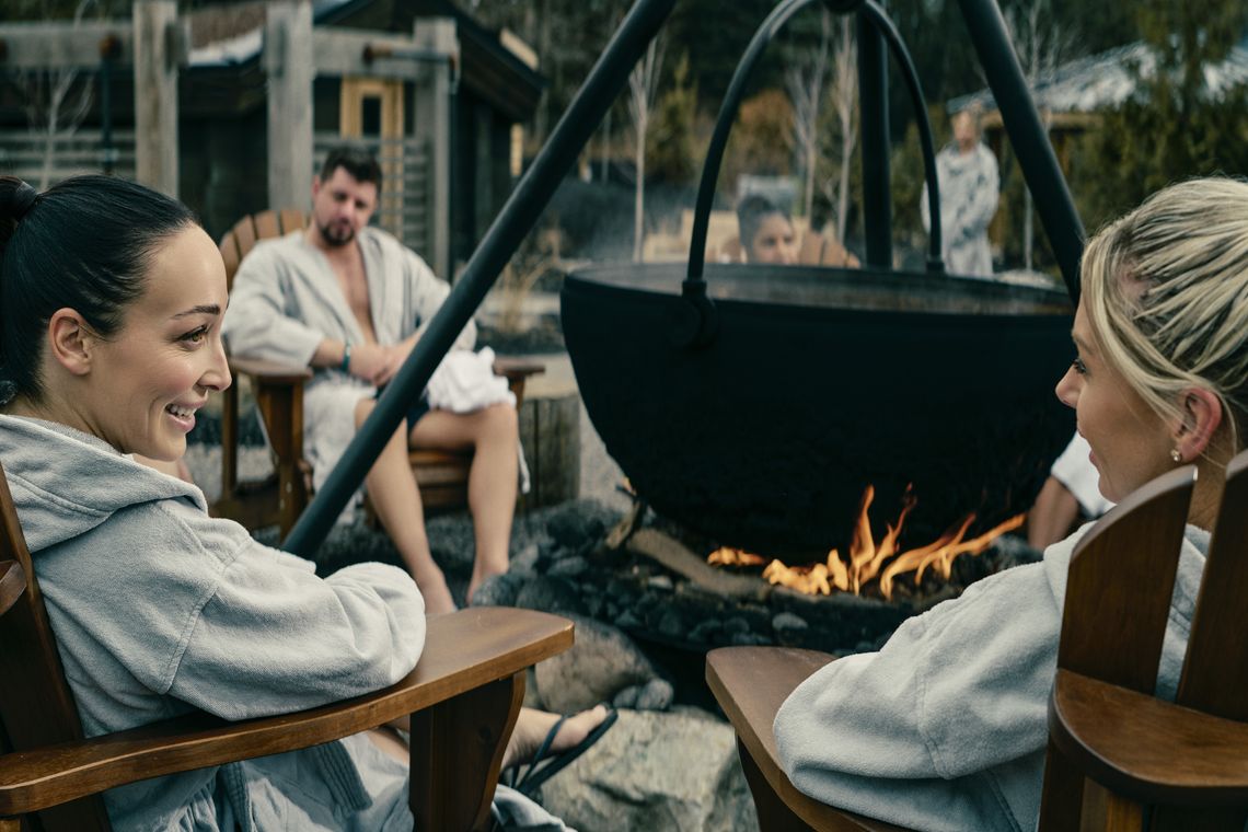 guests around a firepit