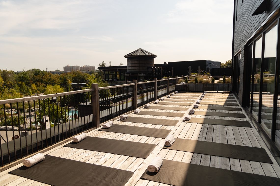 yoga mats on a sunny deck