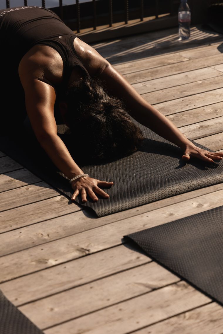 guest doing yoga at the spa