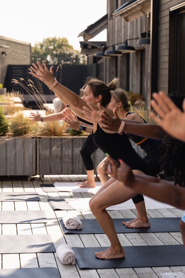 guests doing yoga at the spa