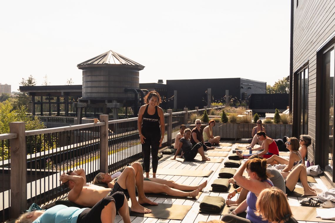 instructor hosting a yoga class at the spa