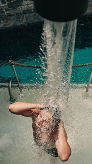 man under a cold plunge