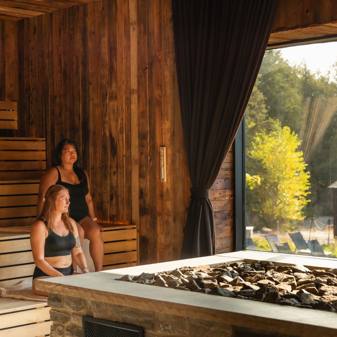 guests in a sauna looking out