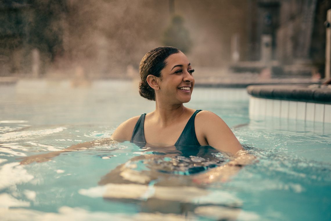 woman in a hot bath, on a misty day