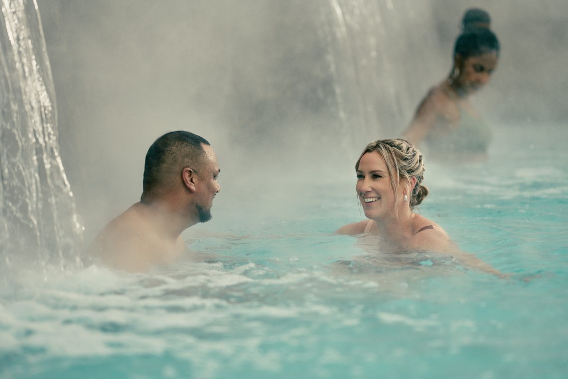 guests in a hot bath