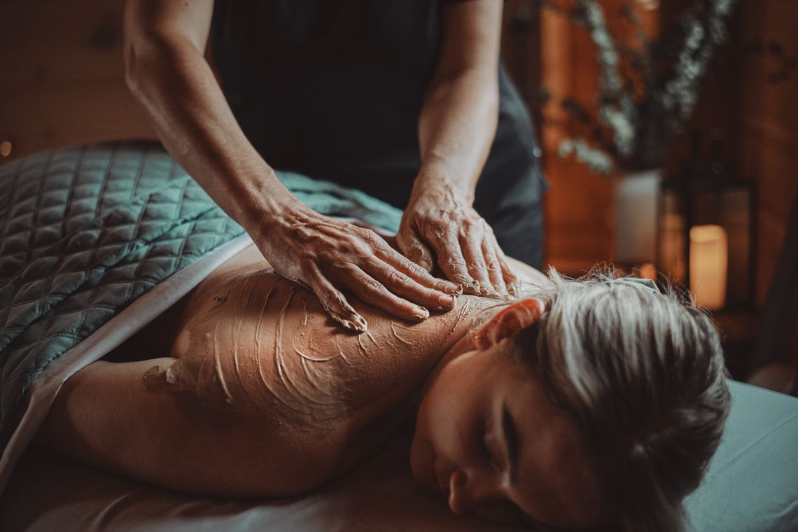 guest enjoying a body care treatment