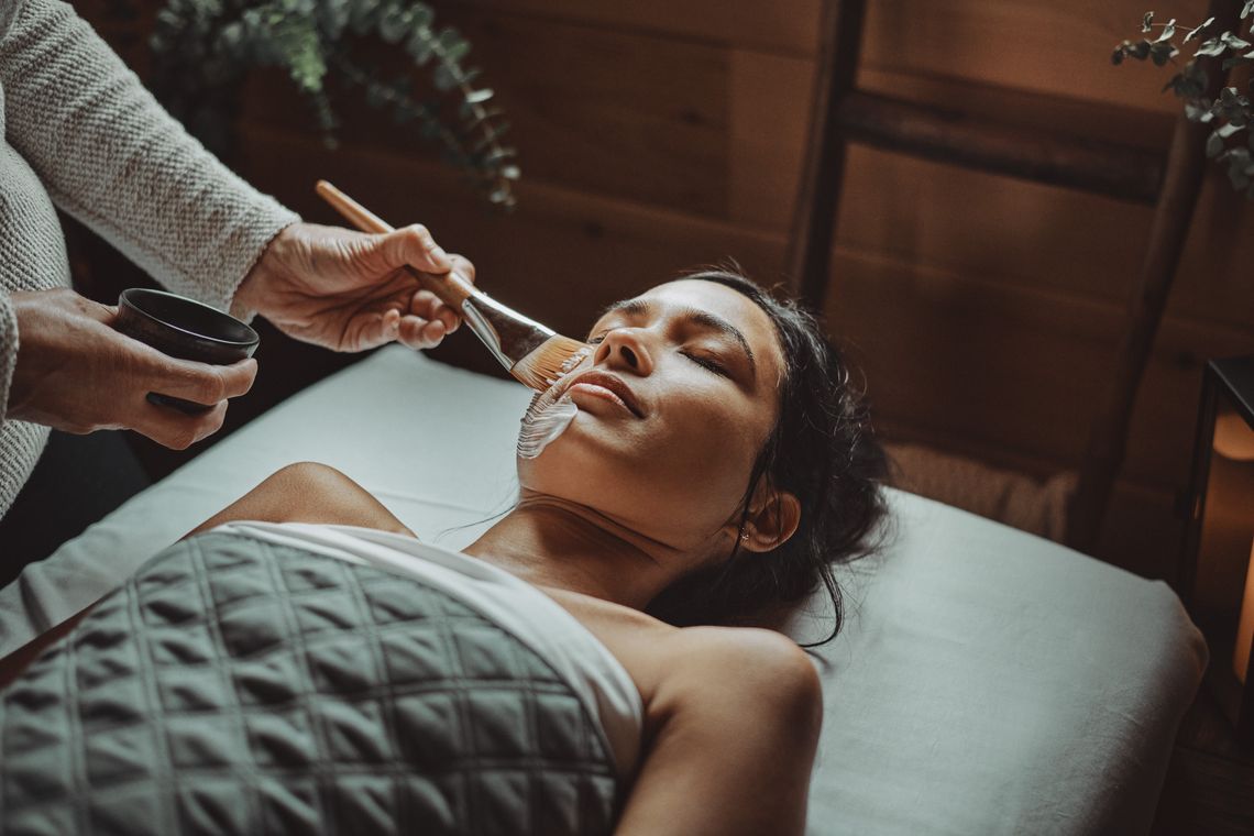 woman enjoying a face care treatment