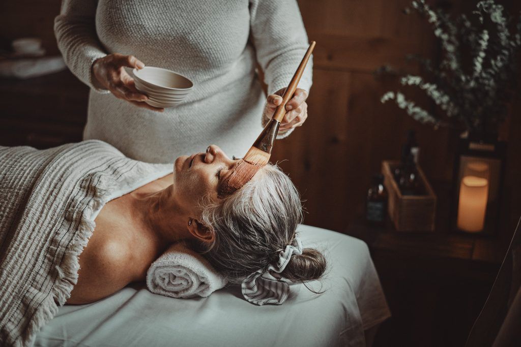 woman receiving the face care treatment