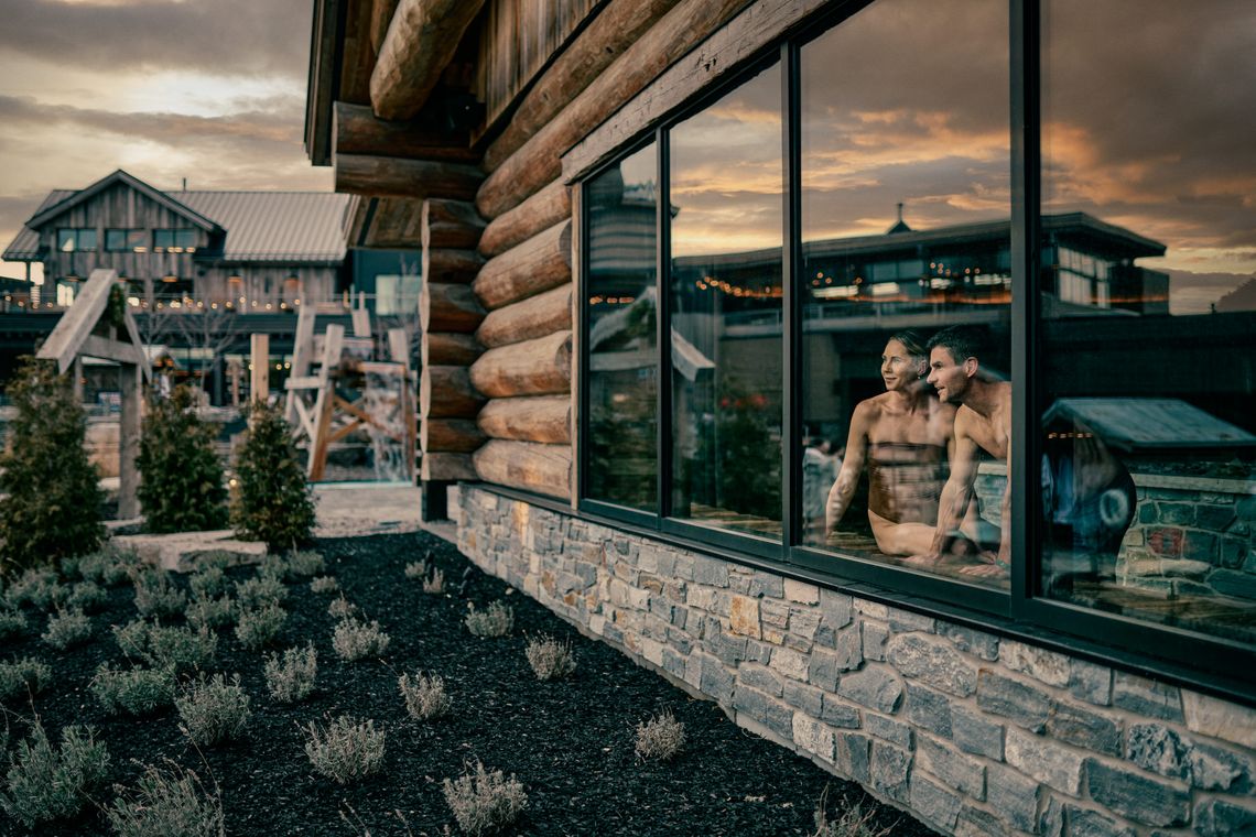 guests in a sauna, looking outward