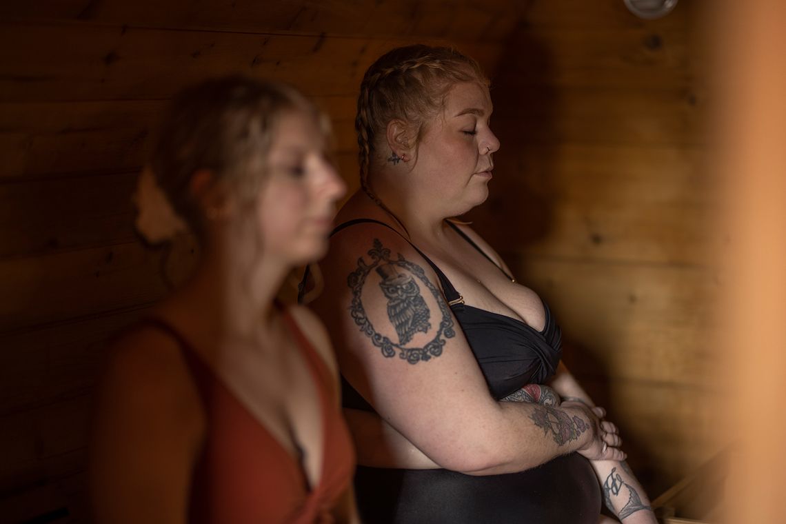 guests relaxing in a sauna