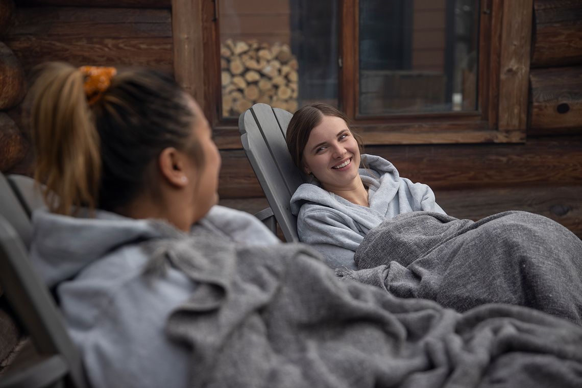 guests resting in lounging chairs at the spa