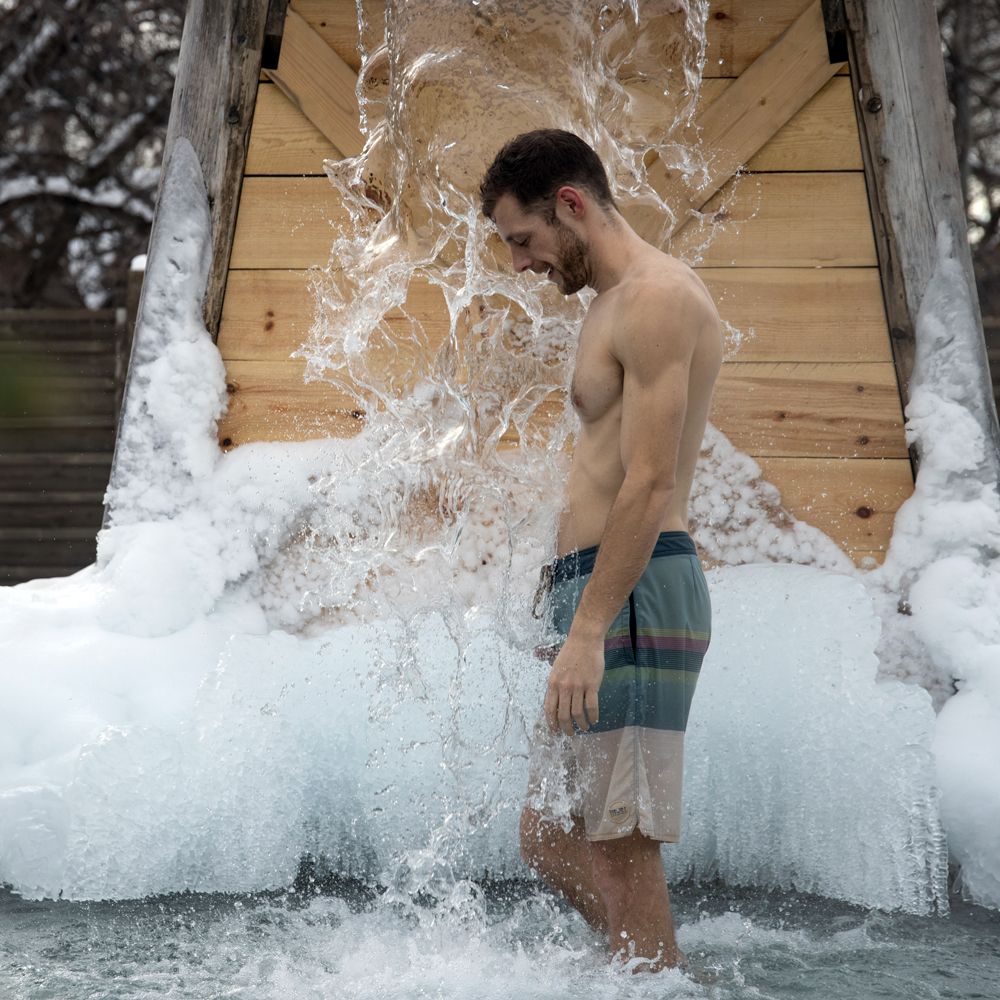 guests under a cold waterfall