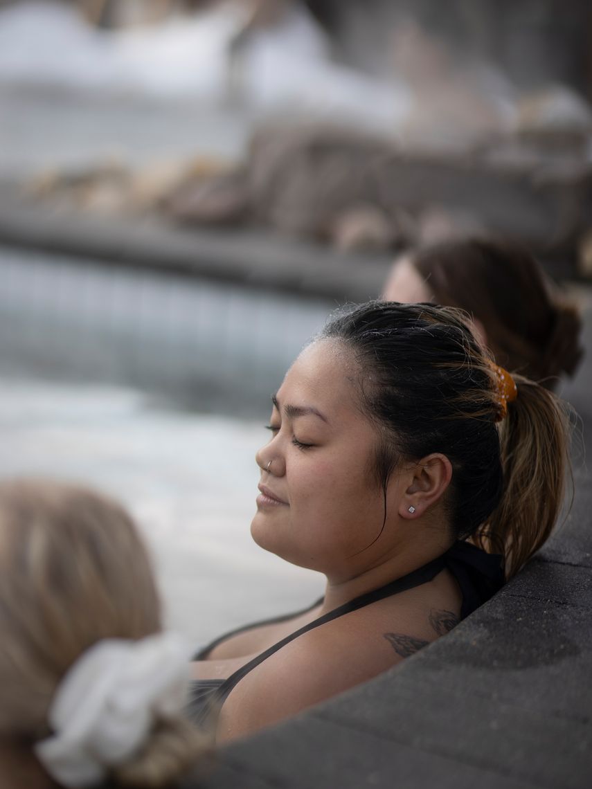 women relaxing in a bath