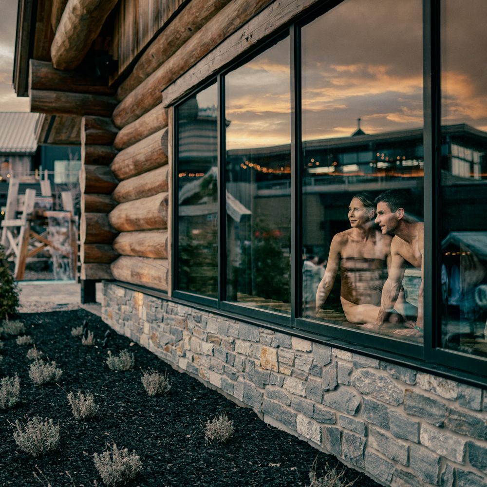 guests in a sauna looking out