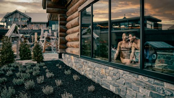guests in a sauna looking out