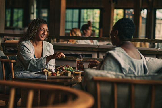 guests enjoying food and drinks at the lounge