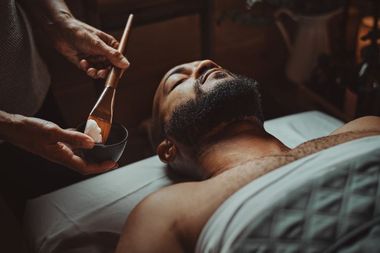 guest enjoying a face care treatment