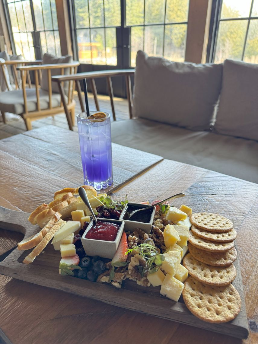 charcuterie board and drink in the lounge