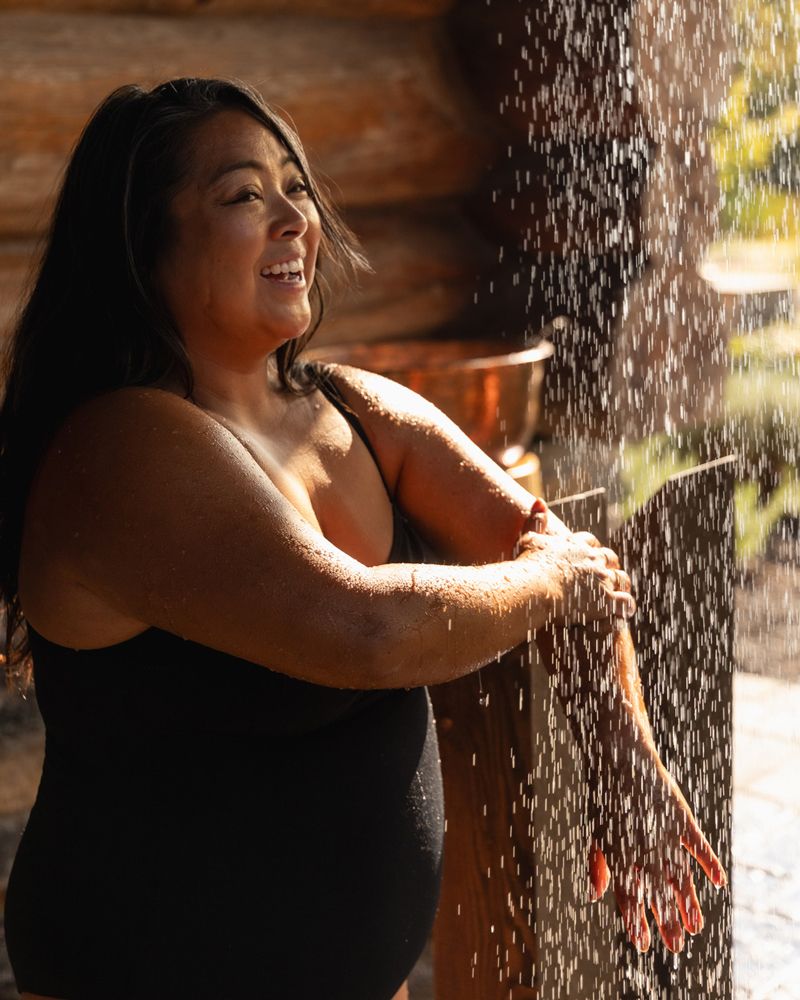 woman exfoliating at the spa