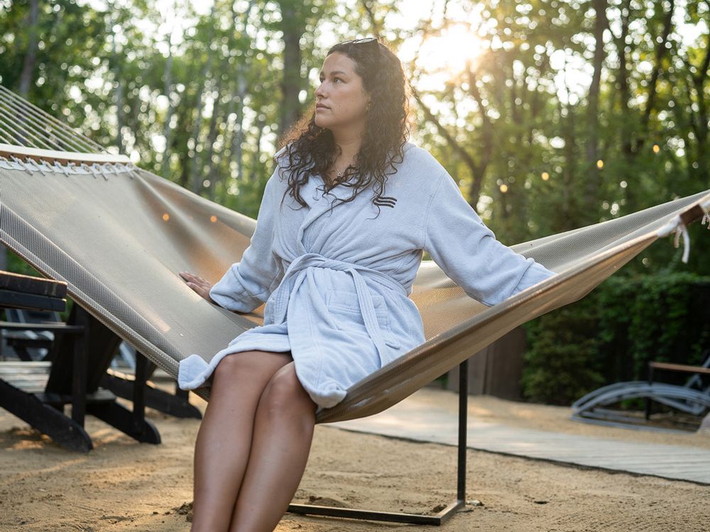 guest relaxing in a hammock