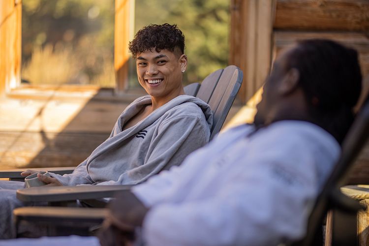 guests resting in lounging chairs at the spa