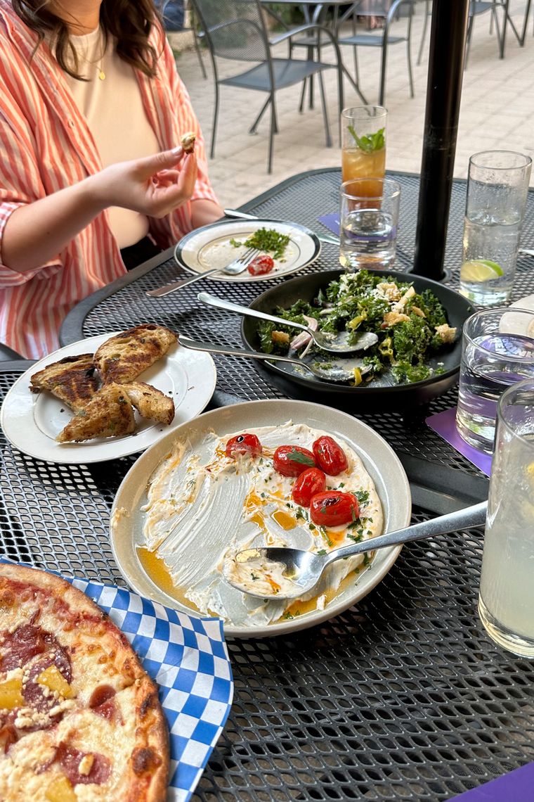 people eating in a patio setting