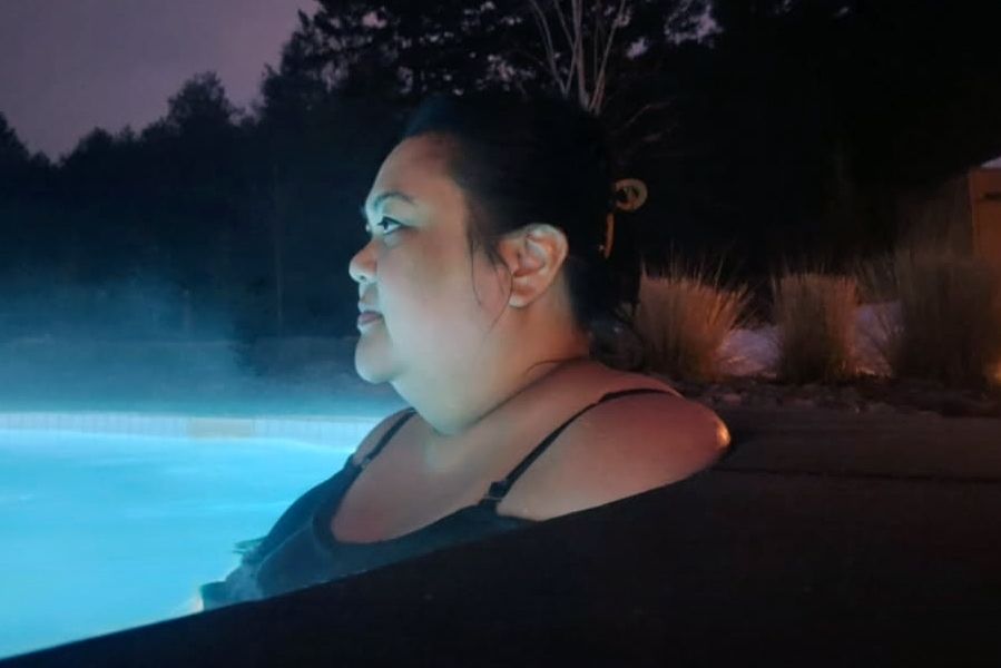 Justine resting in a hot bath