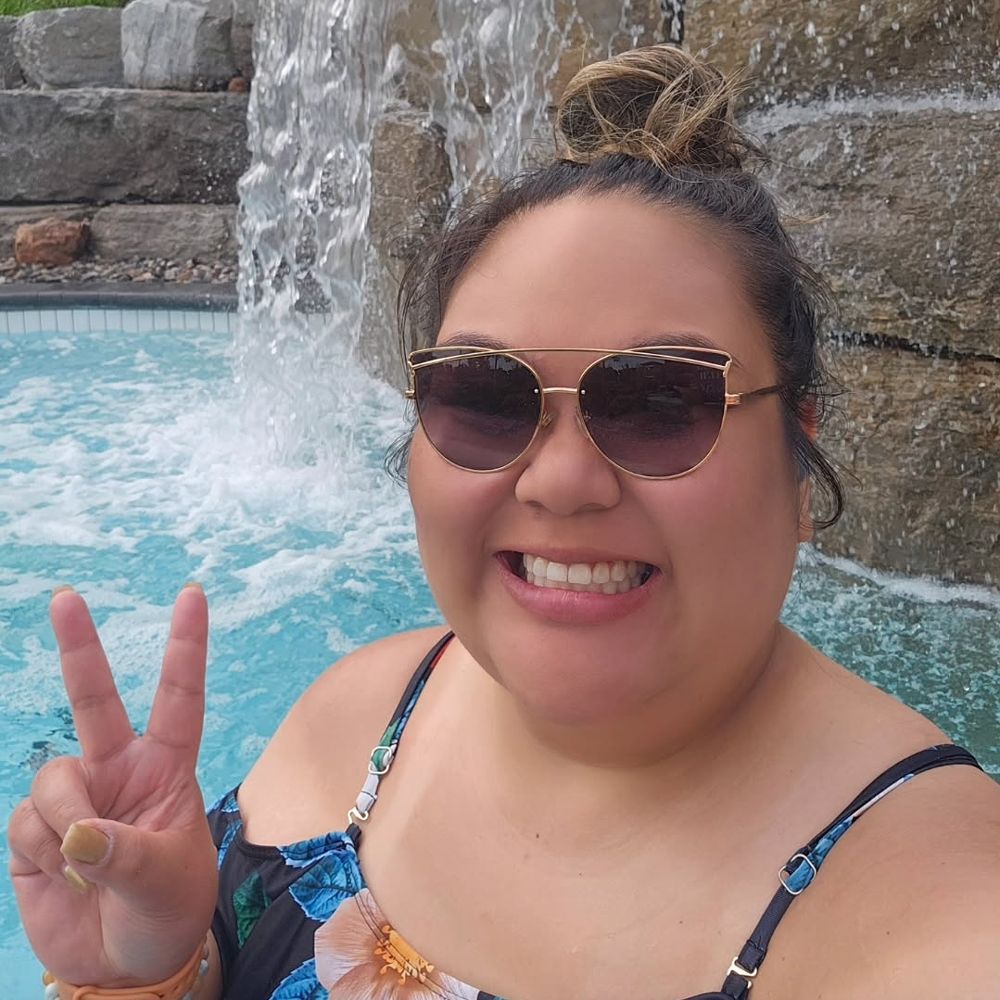 Justine in a bath at the Spa Village