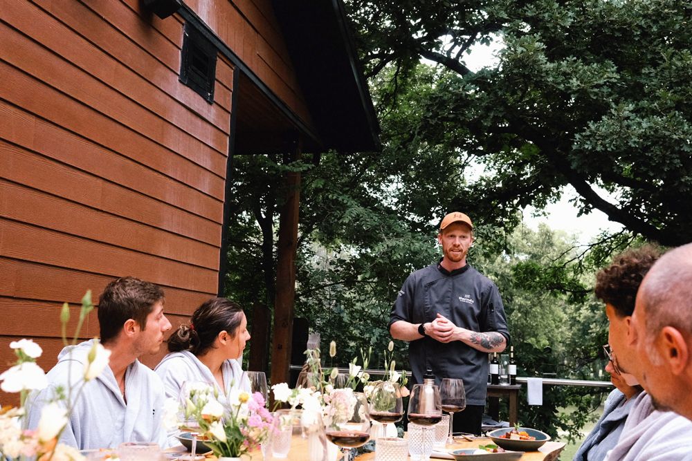 Chef Darnell giving a speech during the Chef's Table event