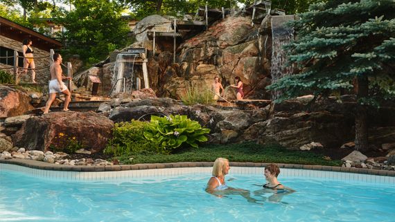 guests enjoying the various installations at Nordik Spa Village in Chelsea