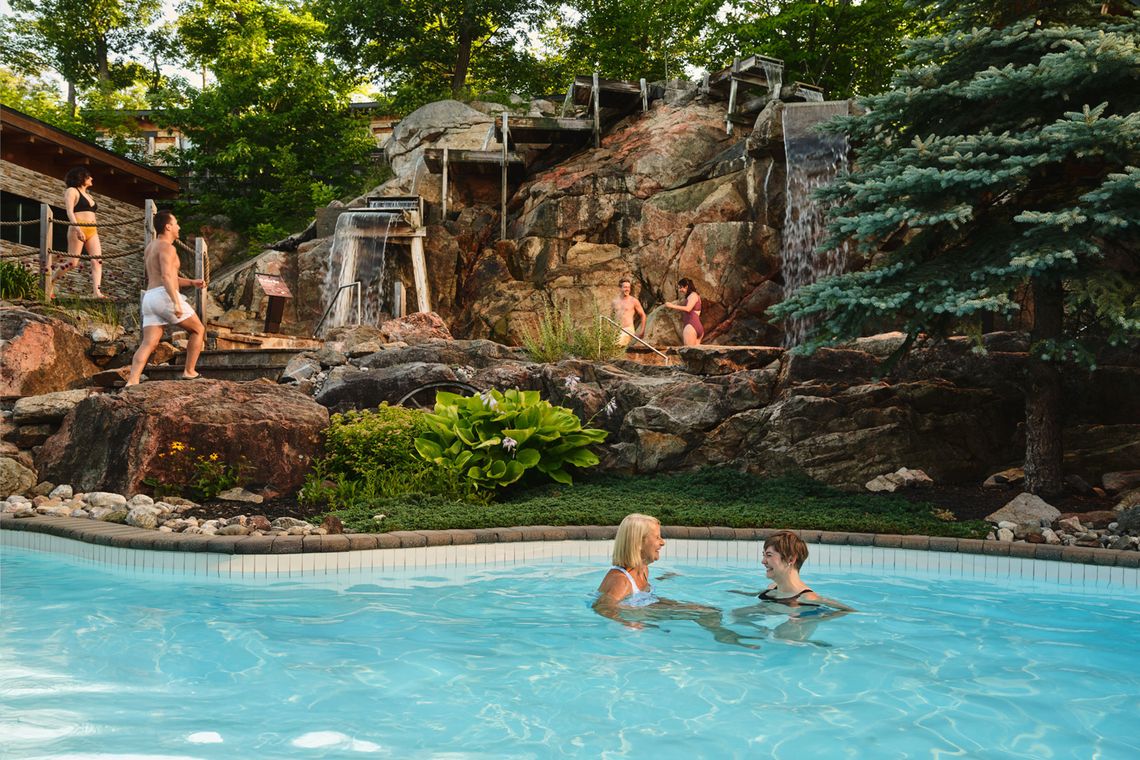 guests enjoying the various installations at Nordik Spa Village in Chelsea