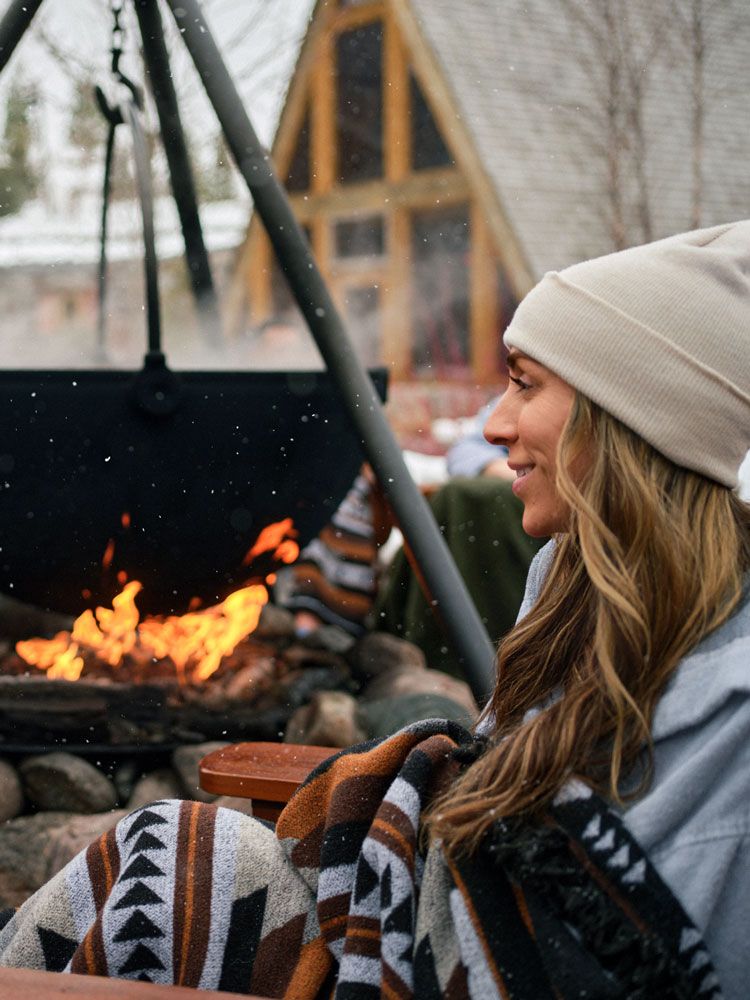guest near a fire cauldron